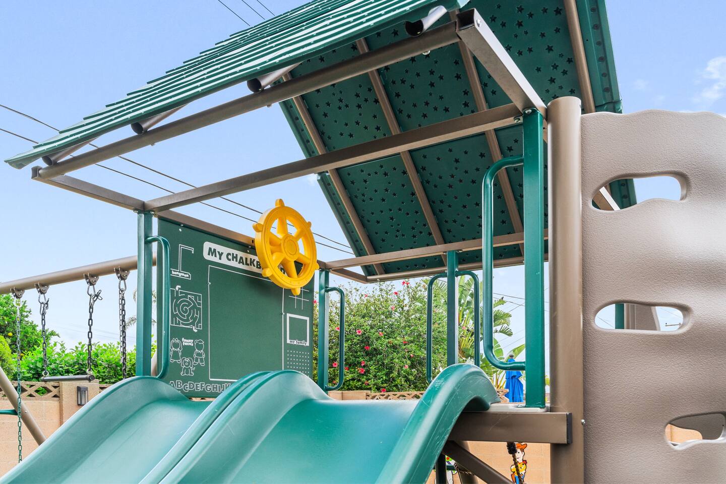 Dual slides on playground fort.