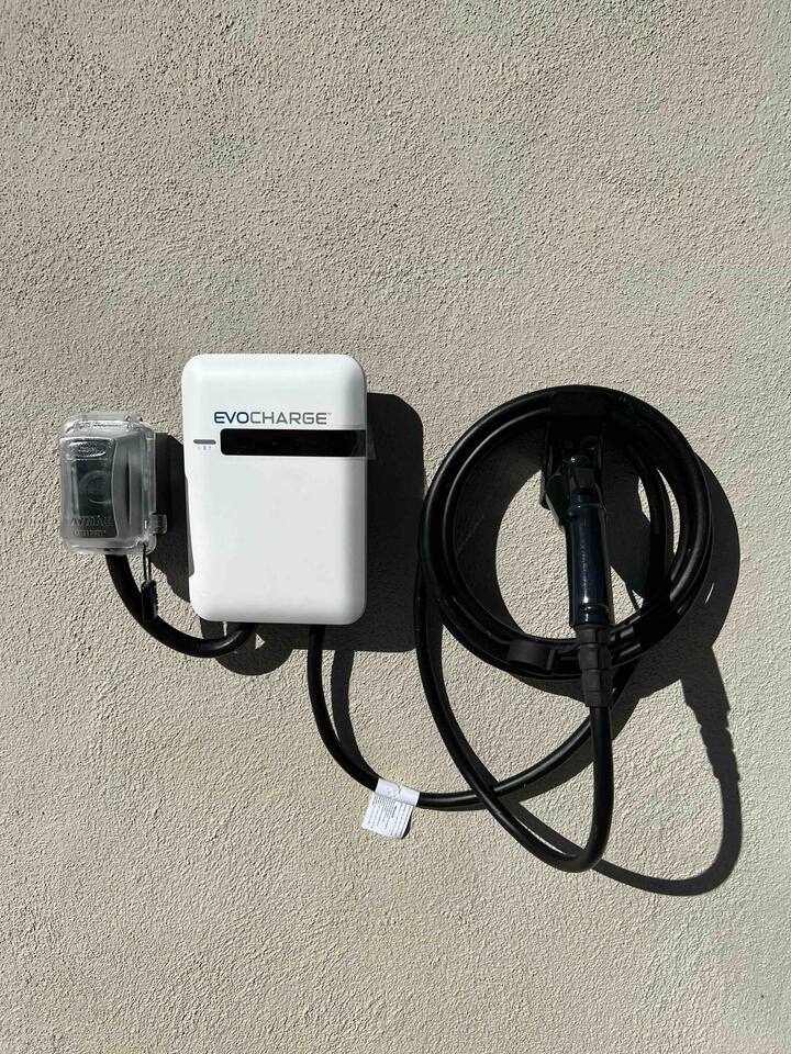 Free car charging at the house!  Level 2 charges at about 30 miles per hour