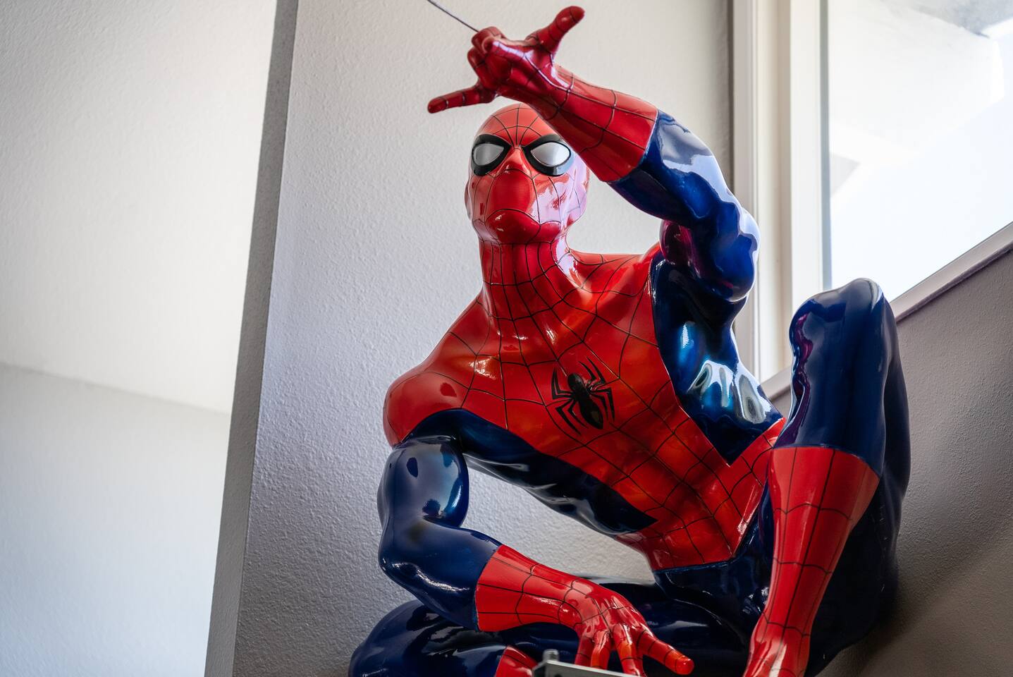 Spiderman statue in the living room!