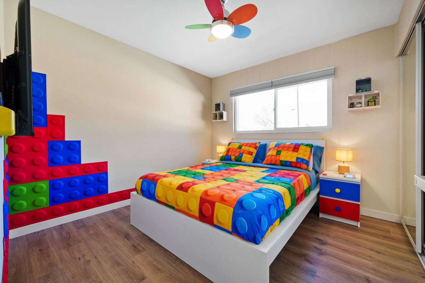 Colorful LEGO guest bedroom with Queen sized bed.