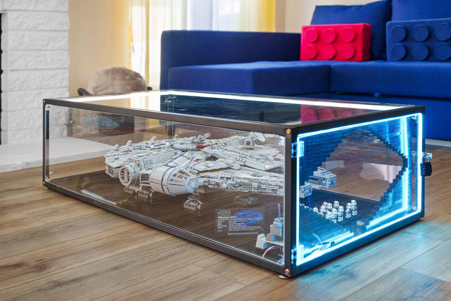 Millennium Falcon LEGO piece inside the coffee table.
