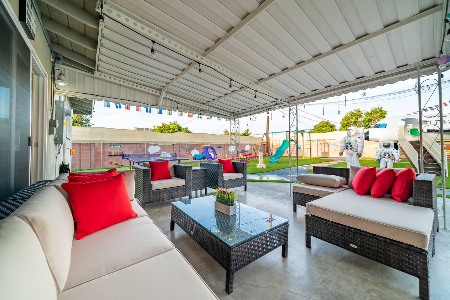 Relax and wind down on the back patio after a long at the parks!