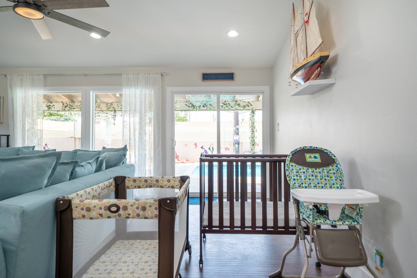 Home supplied with cribs and high chair.