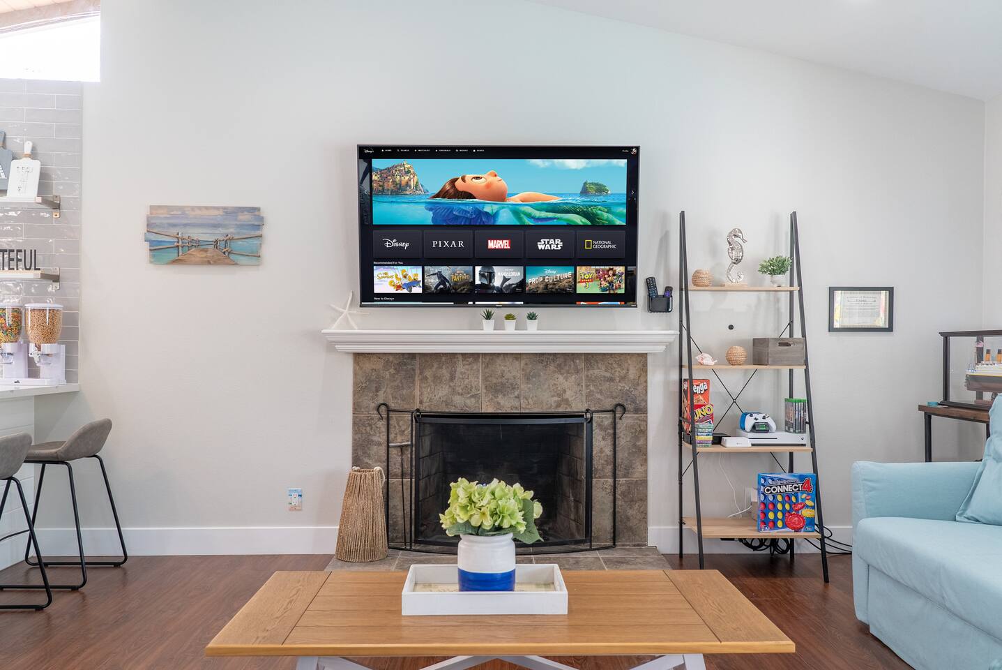 Roku TV in living room with all your favorite streaming platforms.