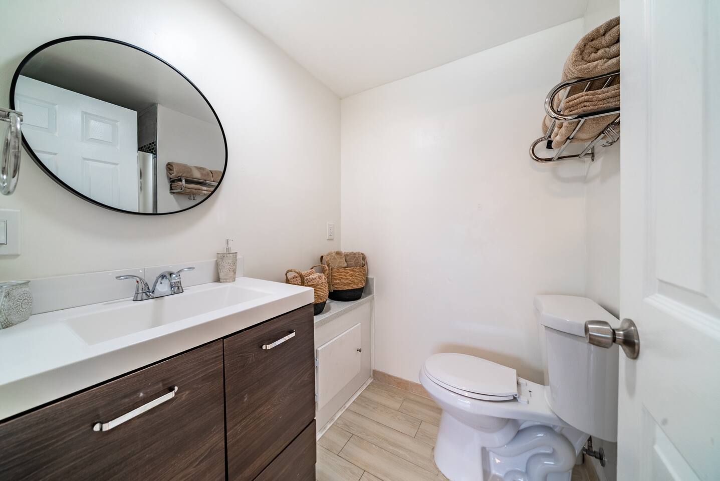 Sleek and modern guest bathroom.