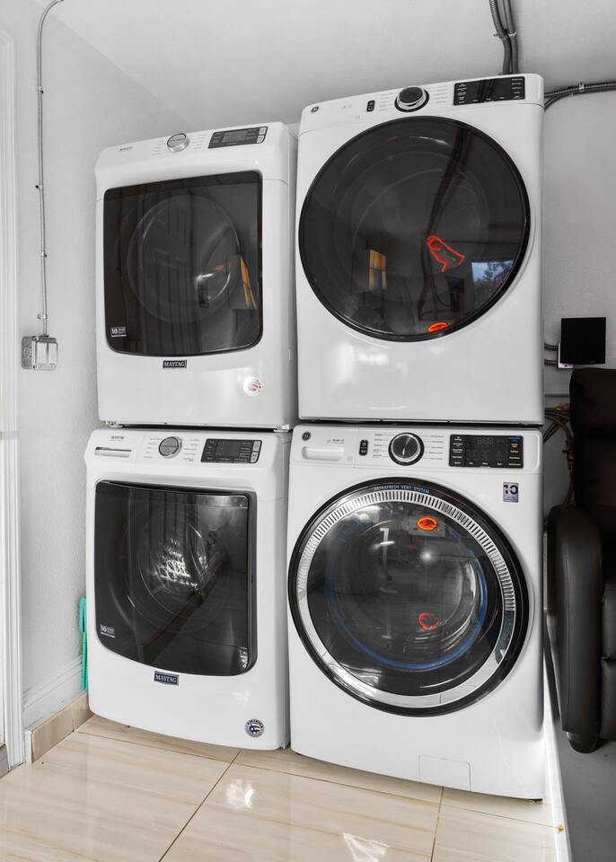 Two sets of washers and dryers!