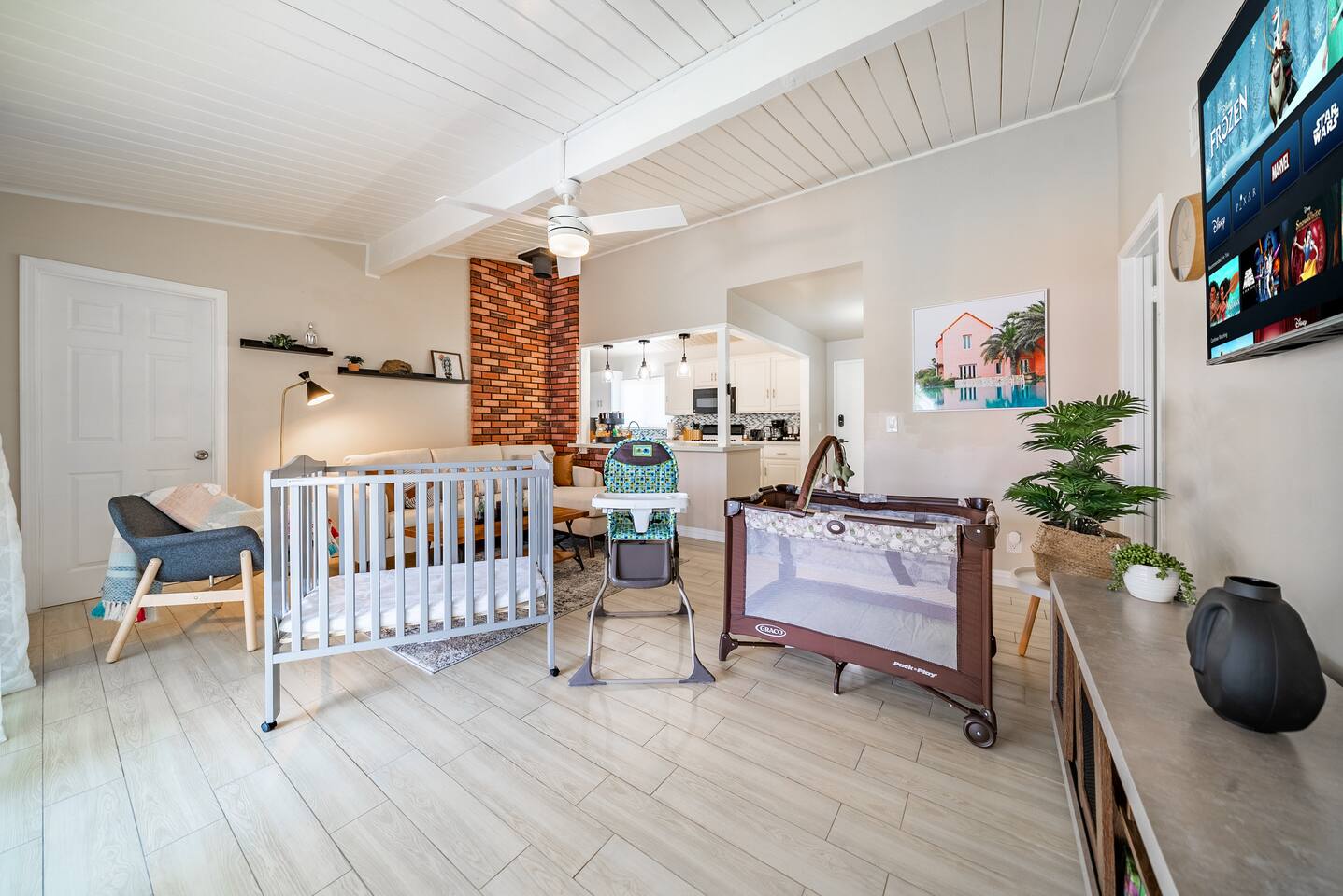 A crib, high  chair, and pac n play for the young ones