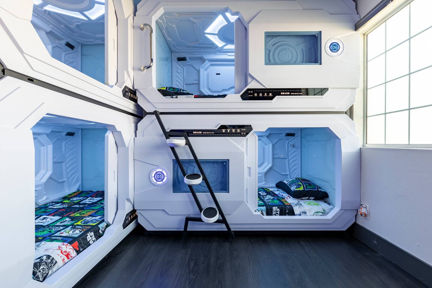 Kid's room has space capsule bunk bed pods!