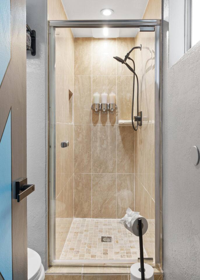 Stylish, walk-in shower.